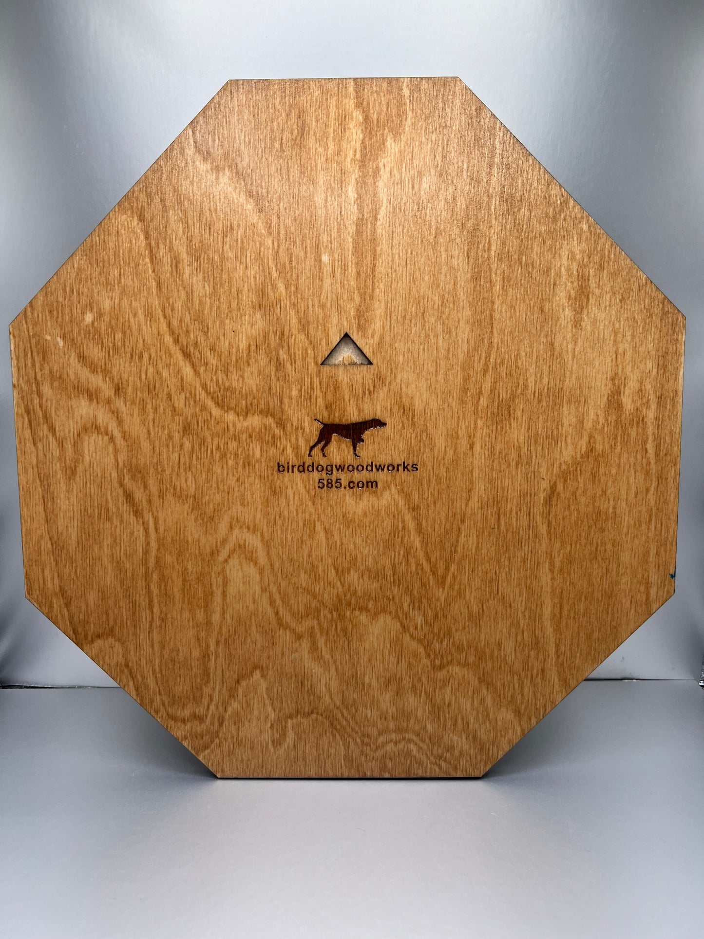 A laser engraved wooden replica of a New York State Police shield badge