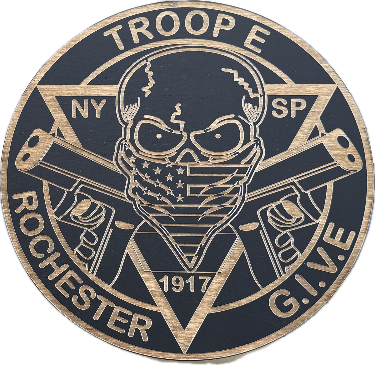 NYSP Troop E Rochester emblem engraved in black and natural wood grain