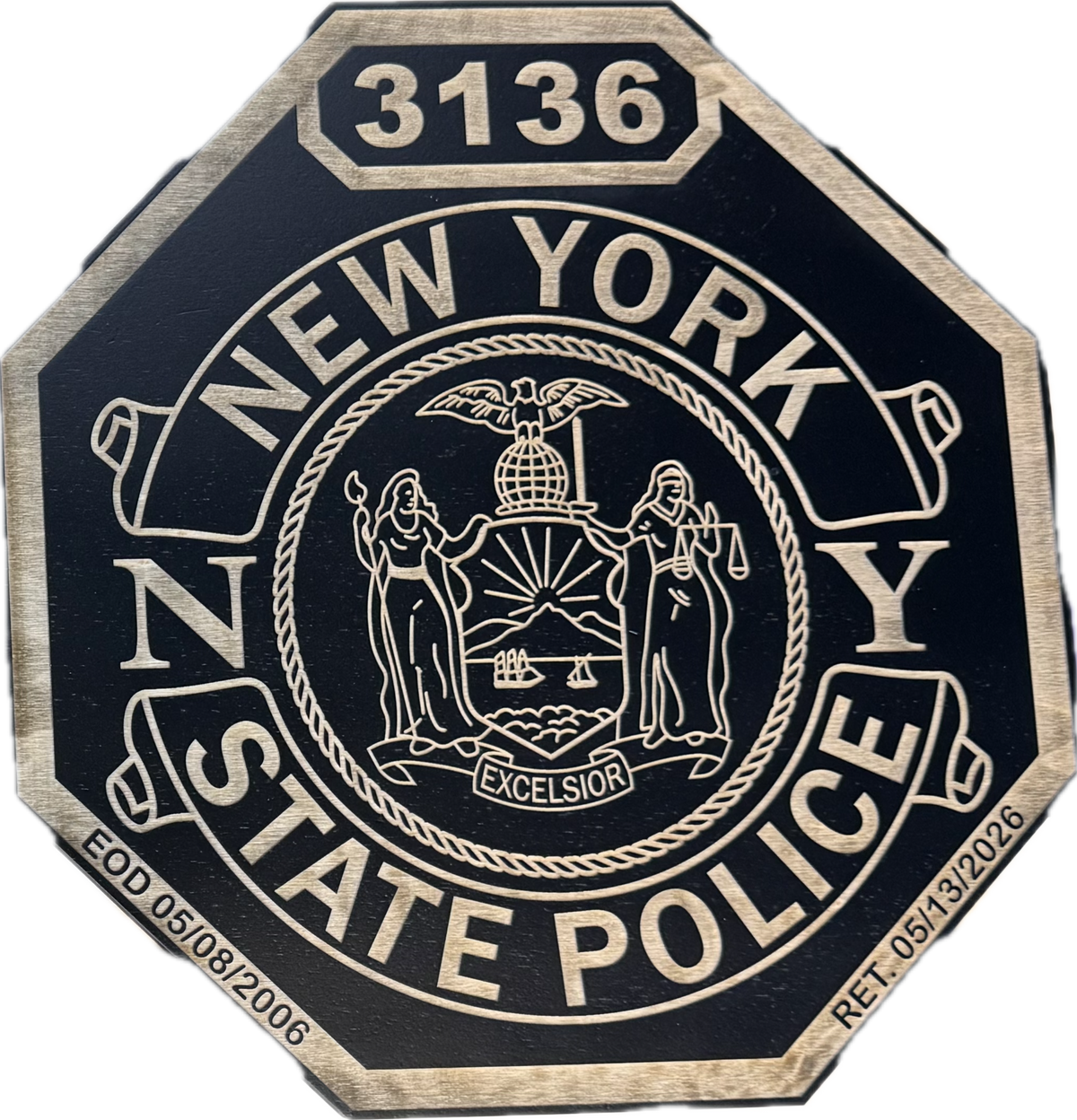 Single-layer NYSP shield laser engraved to natural wood grain, shield number 3136