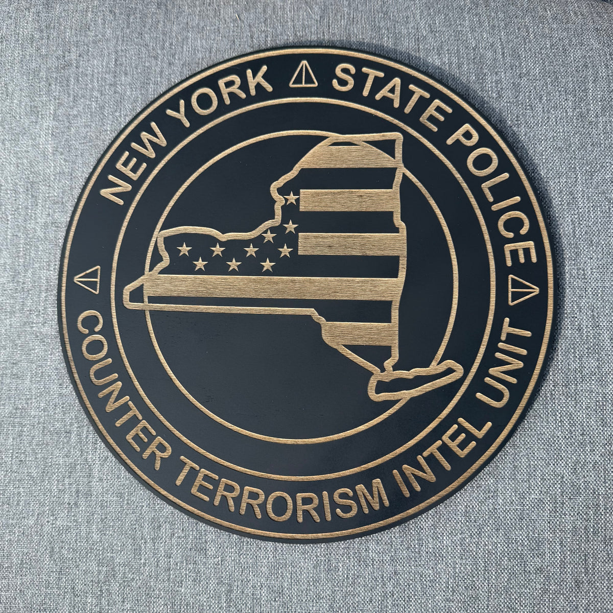 New York State Police Counter Terrorism Intel Unit emblem engraved in black and natural wood grain