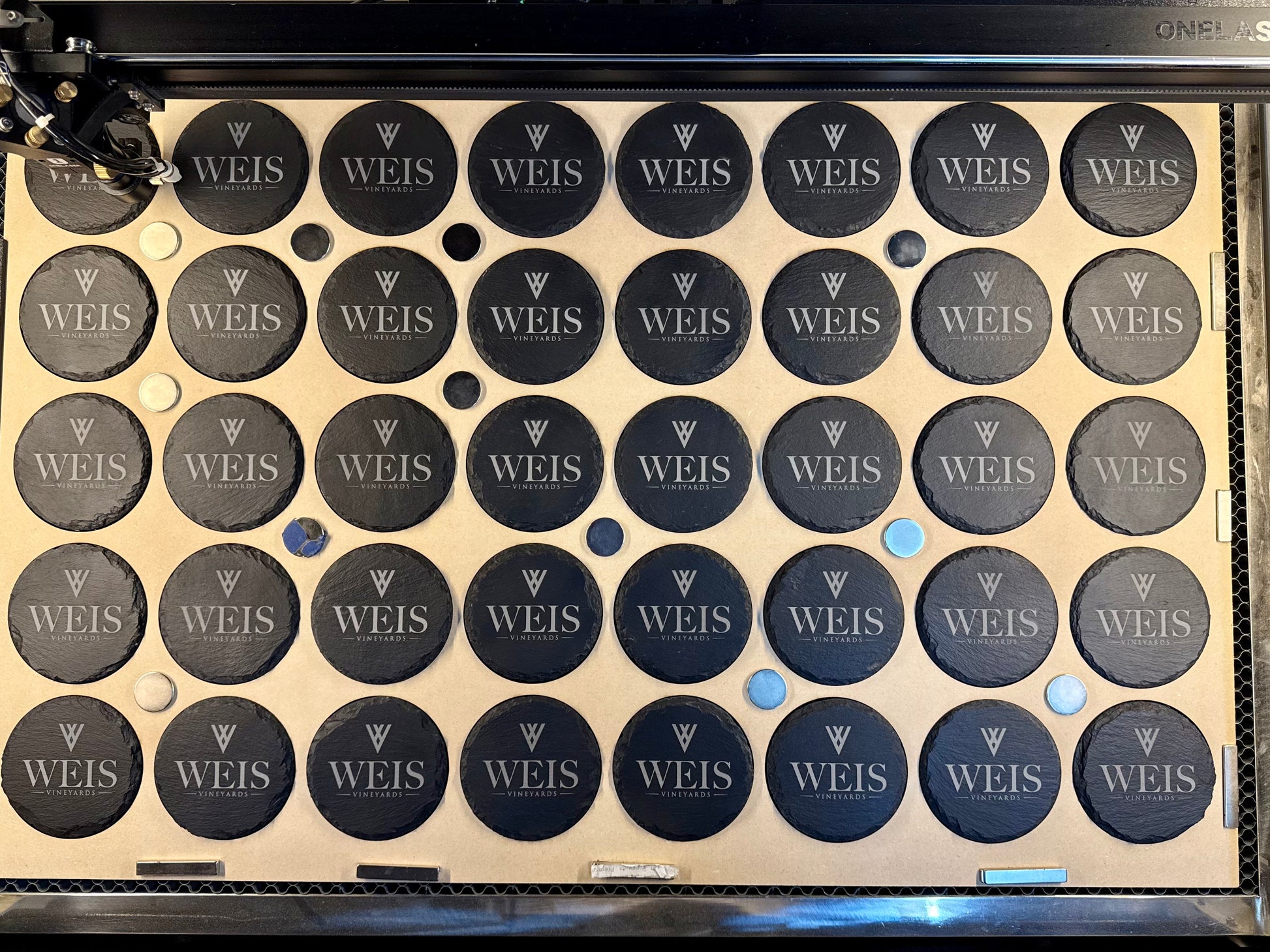Engraved business coasters with Weis Logo