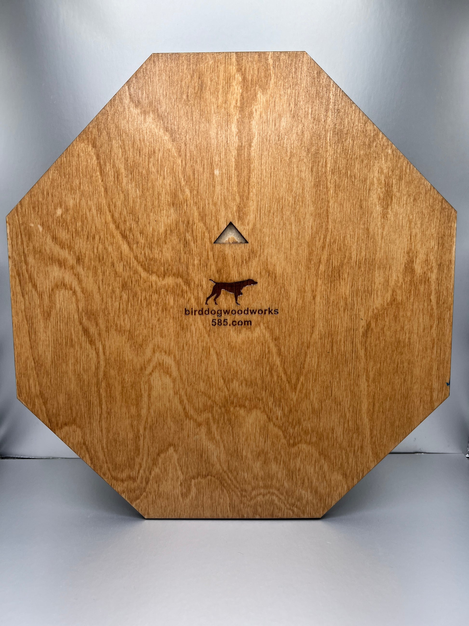 A laser engraved wooden replica of a New York State Police shield badge